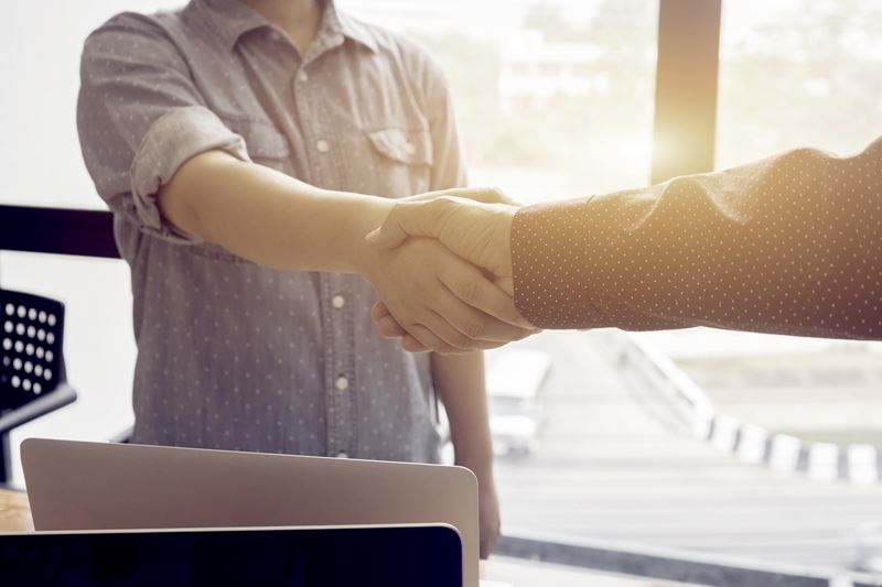 Two men shaking hands